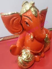 Orange Color Alloy Metal Lord Ganesh Showpiece